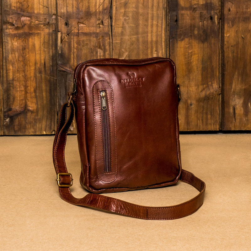 Tan leather sling outlet bag